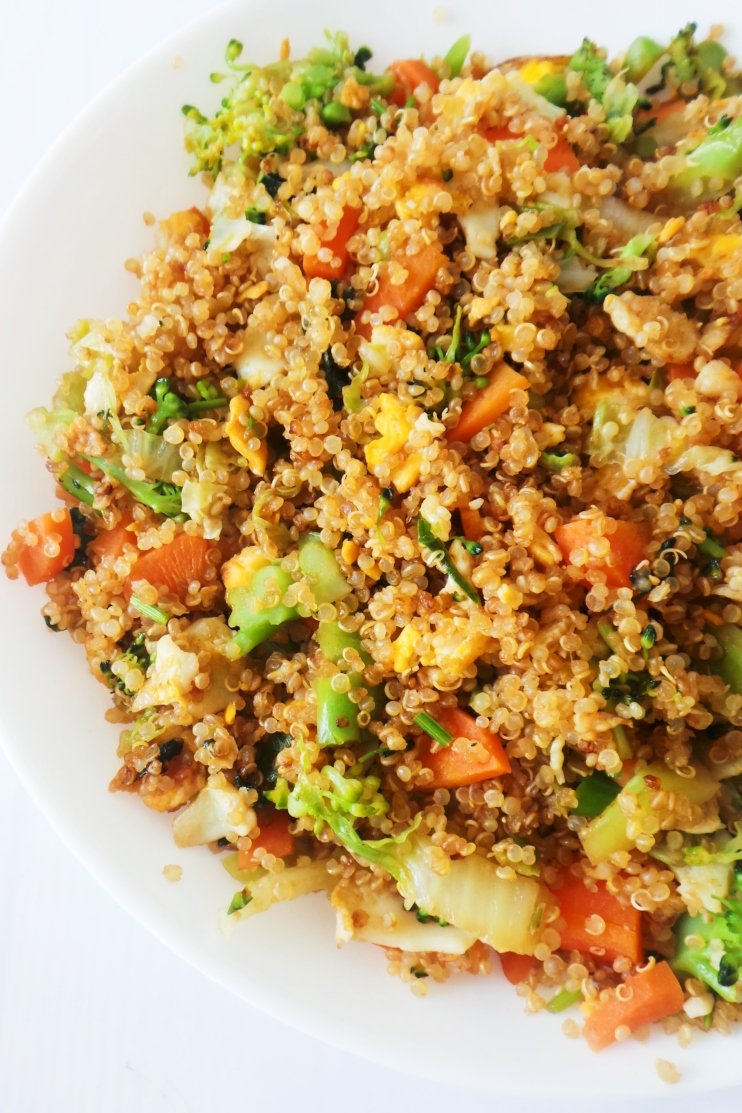 Super tasty 15-Minute Quinoa fried rice! Easy healthy dinner recipe you will gladly eat every single day! This simple quinoa recipe is vegetarian and gluten-free if you use tamari sauce! This recipe also keeps well in the fridge, so if you'd like to meal prep it, you can do so, but you'll need to double the ingredients.