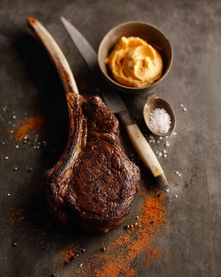 Start by patting the steak dry—don’t rush this part. A dry surface means better browning. Season generously with salt and pepper (like, really generously), then place it on a rack and let it sit for 20 minutes while the oven preheats. Now comes the reverse sear magic. Place the steak in a low oven and let it slowly warm until it reaches your ideal doneness temperature minus 10°C. This gentle heat keeps the inside rosy and even rather than gray. Once it’s rested a few minutes, heat a heavy pan until it’s practically smoking. Add a splash of oil, drop the steak in, and listen to that glorious roar. Add butter, garlic, and herbs, tilting the pan to baste the meat with the sizzling foam. Flip, baste again, admire your crust, and then—very important—let it rest before slicing.