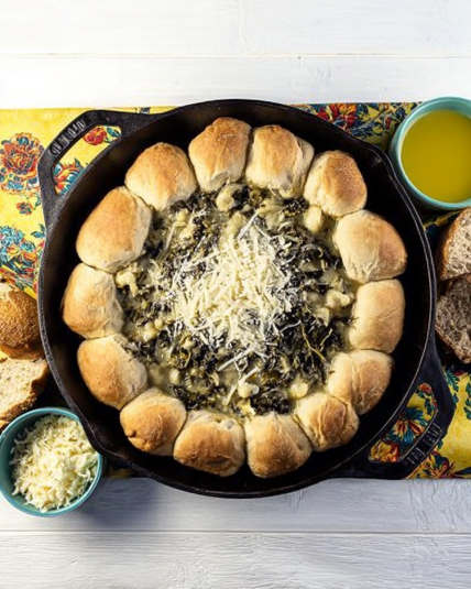 Spinach and Artichoke Biscuit Skillet
